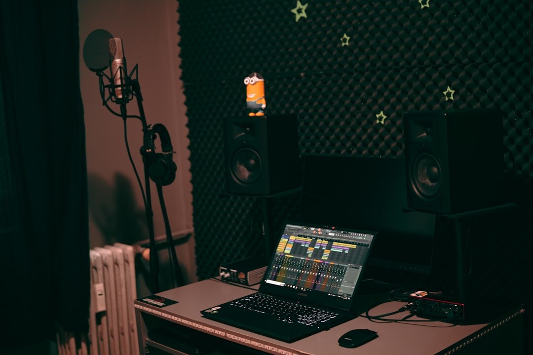 Audio and music production setup with DJ controller and synthesizer